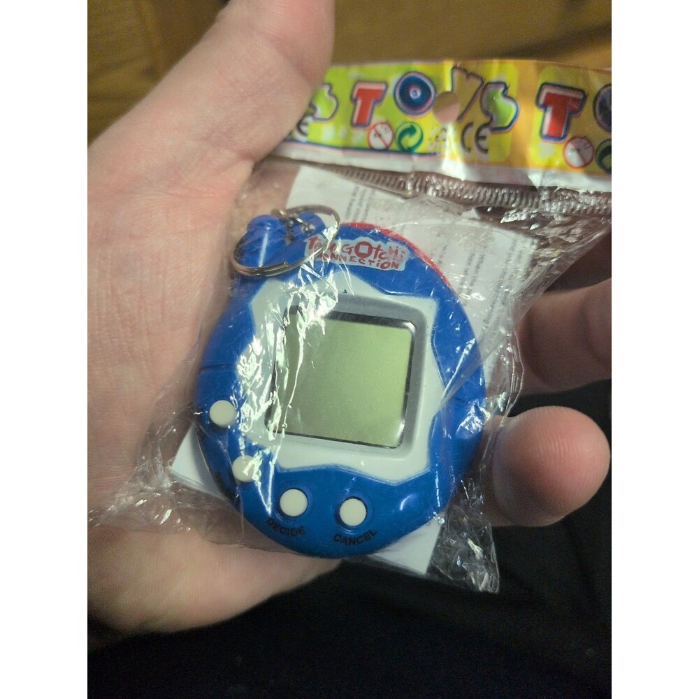 Tamagotchi Connection Electronic Retro 90’s Virtual Cyber Pet Toy Game Keychain